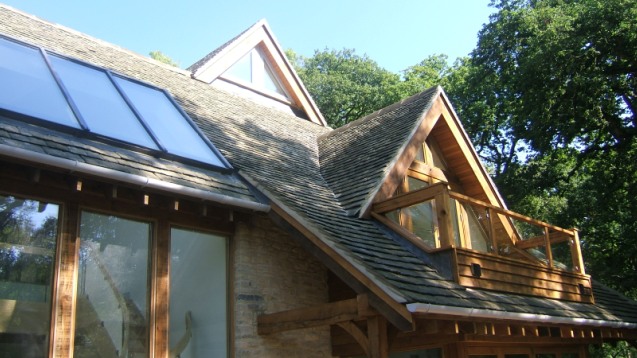 Roof windows fitted into a tiled roof