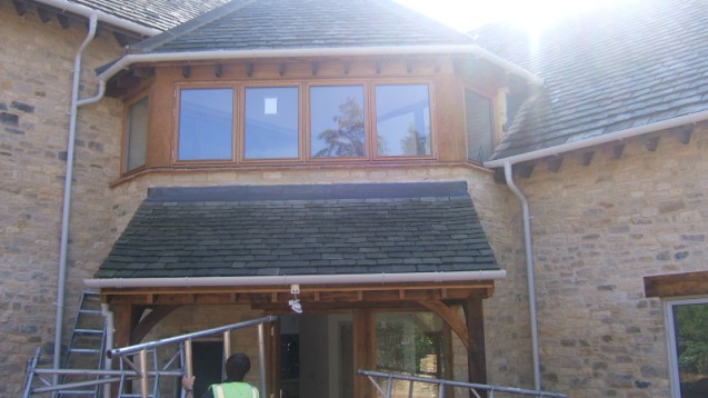 Porch canopy roof and roofline on an oak-framed house