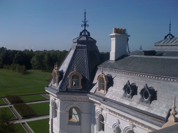 Slate mansard roof with lead dormers